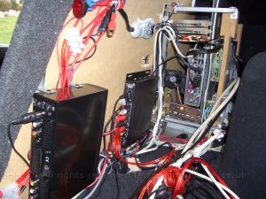 camm2.jpg - Here you can see the rear of the cage with the DTT tuner and scart selector for future use