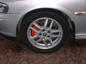 brakepaintfrount.jpg - I painted the calipers on the SRI B red which along with silver became the theme for the car